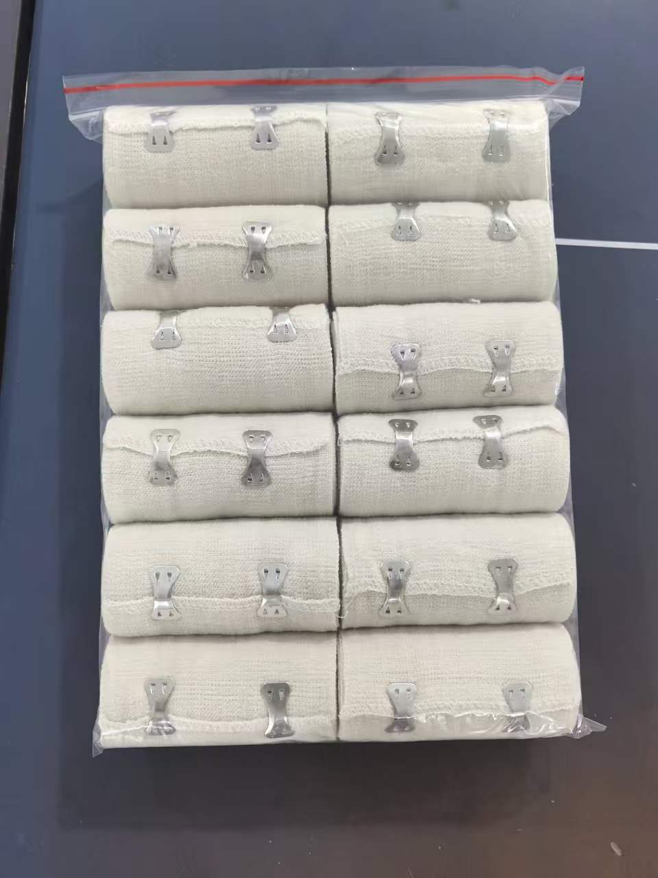 Медицинска новост на Haorun: 105g & 120g спандекс сплитана превръзка с гладък ръб (естествено бяла) – идеална за пазара от висок клас